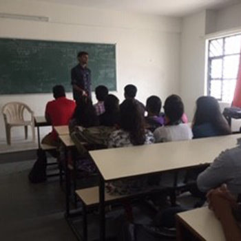 B.Com ALUMNI Mr.Rohit Sharma addressing the present B.Com students regarding placments
